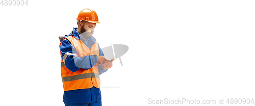 Image of Handsome contractor, builder isolated over white studio background