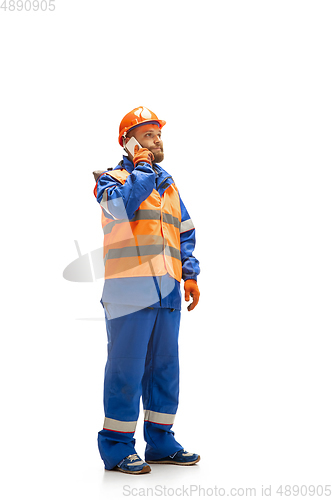 Image of Handsome contractor, builder isolated over white studio background