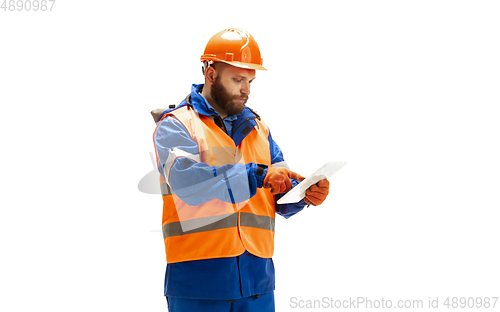 Image of Handsome contractor, builder isolated over white studio background