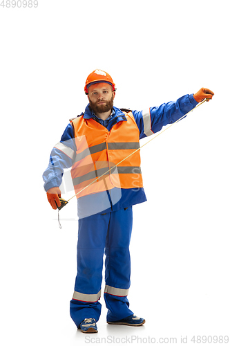 Image of Handsome contractor, builder isolated over white studio background