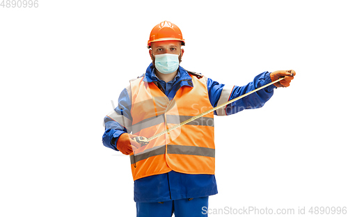 Image of Handsome contractor, builder isolated over white studio background