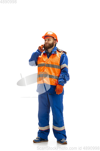 Image of Handsome contractor, builder isolated over white studio background