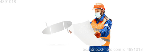 Image of Handsome contractor, builder isolated over white studio background