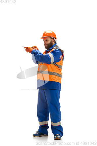 Image of Handsome contractor, builder isolated over white studio background