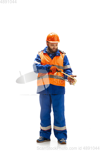 Image of Handsome contractor, builder isolated over white studio background