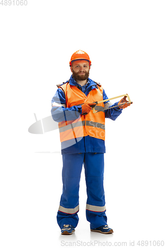 Image of Handsome contractor, builder isolated over white studio background