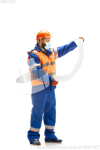 Image of Handsome contractor, builder isolated over white studio background