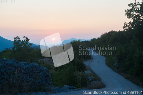 Image of Scenic view of beautiful sunset above Biokovo mountain nature park