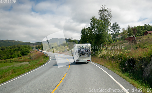 Image of VR Caravan car travels on the highway.