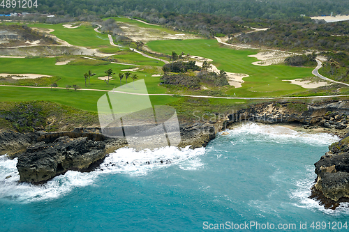 Image of Flying above a golf course at an exotic destination