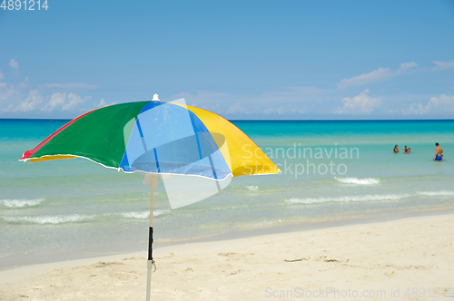 Image of Parasol on exotic beach