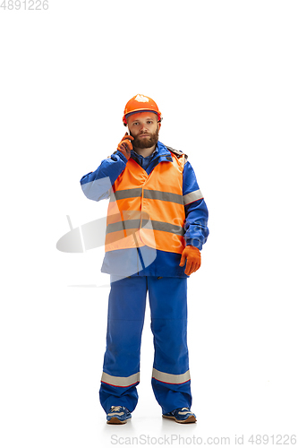 Image of Handsome contractor, builder isolated over white studio background