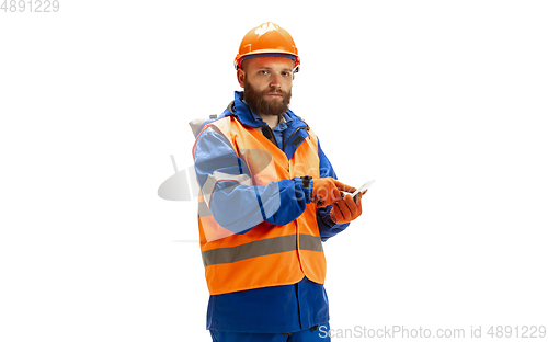 Image of Handsome contractor, builder isolated over white studio background