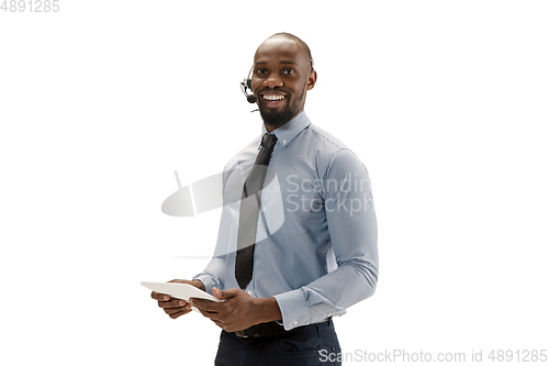 Image of Young african-american call center consultant with headset isolated on white studio background