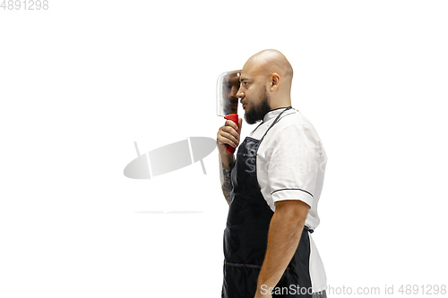 Image of Portrait of a male chef cook, butcher isolated on a white studio background