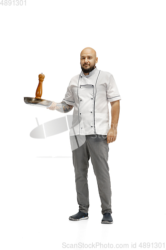 Image of Portrait of a male chef cook, butcher isolated on a white studio background
