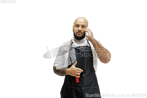 Image of Portrait of a male chef cook, butcher isolated on a white studio background
