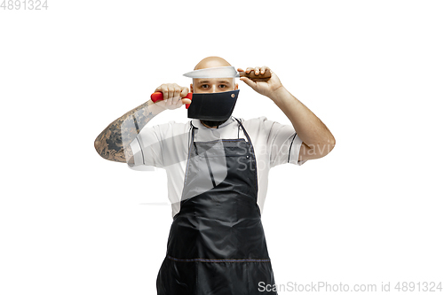 Image of Portrait of a male chef cook, butcher isolated on a white studio background