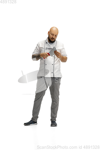 Image of Portrait of a male chef cook, butcher isolated on a white studio background