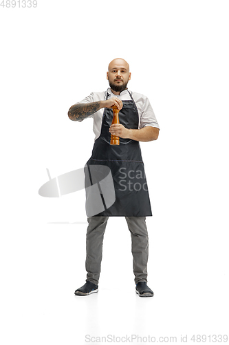 Image of Portrait of a male chef cook, butcher isolated on a white studio background