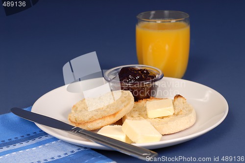 Image of English muffin butter, jam, juice