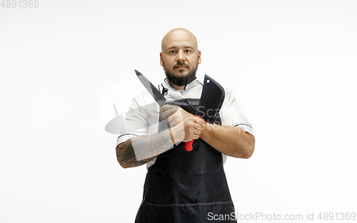 Image of Portrait of a male chef cook, butcher isolated on a white studio background