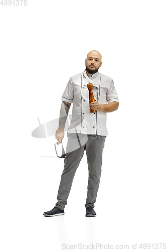 Image of Portrait of a male chef cook, butcher isolated on a white studio background