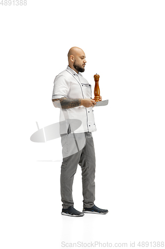 Image of Portrait of a male chef cook, butcher isolated on a white studio background
