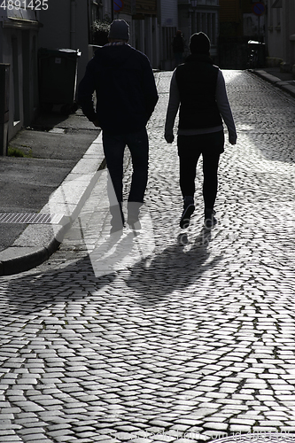 Image of A couple walking.