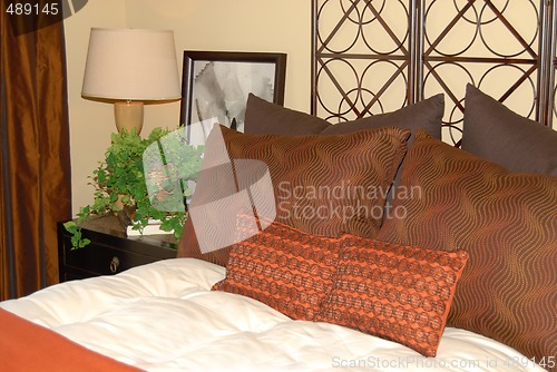 Image of Comfortable bed with pillows