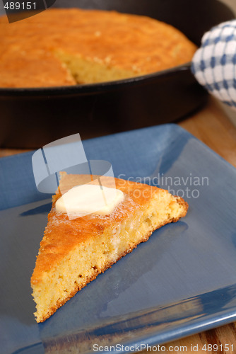 Image of Slice of cornbread with melting butter