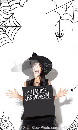 Image of Young woman a witch on scary background