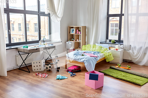 Image of messy home or kid's room with scattered stuff