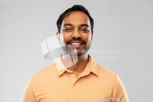 Image of portrait of happy smiling young indian man