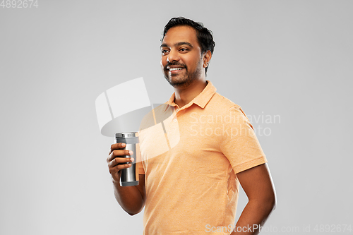 Image of indian man with thermo cup or tumbler for drink