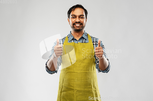 Image of indian male gardener or farmer showing thumbs up