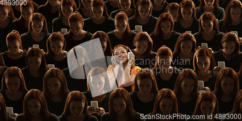 Image of Top view of grey crowd of identical people and special one woman, difference and diversity concept