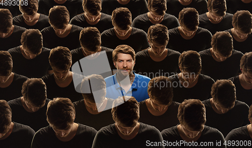 Image of Top view of grey crowd of identical people and special one man, difference and diversity concept