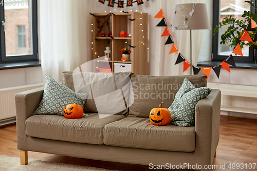 Image of jack-o-lanterns and halloween decorations at home