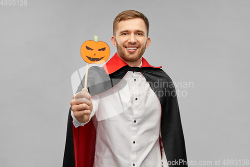 Image of happy man in halloween costume of vampire