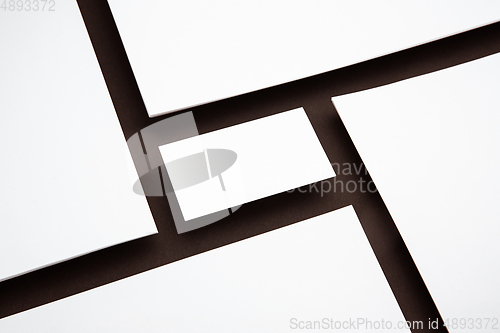 Image of Blank flyer poster isolated on brown background to replace your design