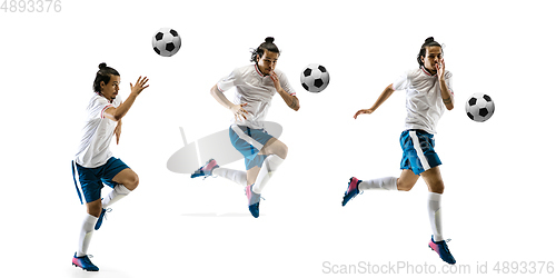 Image of Confident football player in motion and action isolated on white background, kicking ball in dynamic