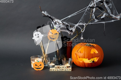 Image of happy halloween toy blocks and party decorations