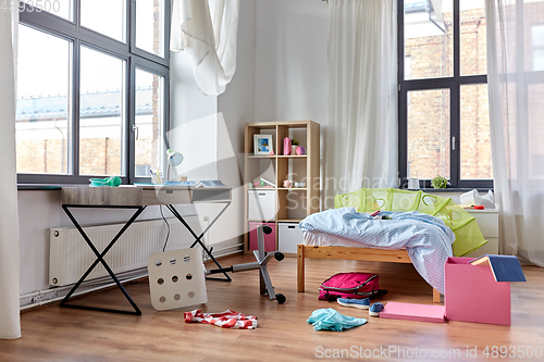 Image of messy home or kid's room with scattered stuff