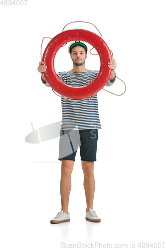 Image of Caucasian male sailor in uniform isolated on white studio background