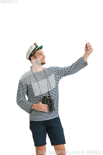 Image of Caucasian male sailor in uniform isolated on white studio background