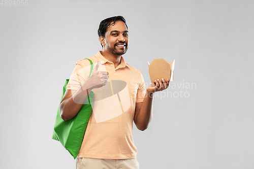 Image of man with reusable shopping bag and takeout food