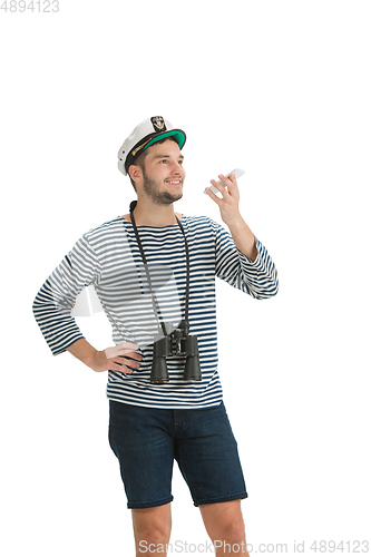 Image of Caucasian male sailor in uniform isolated on white studio background