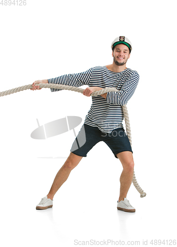 Image of Caucasian male sailor in uniform isolated on white studio background