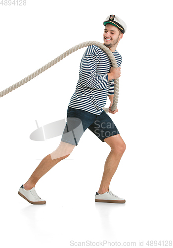 Image of Caucasian male sailor in uniform isolated on white studio background